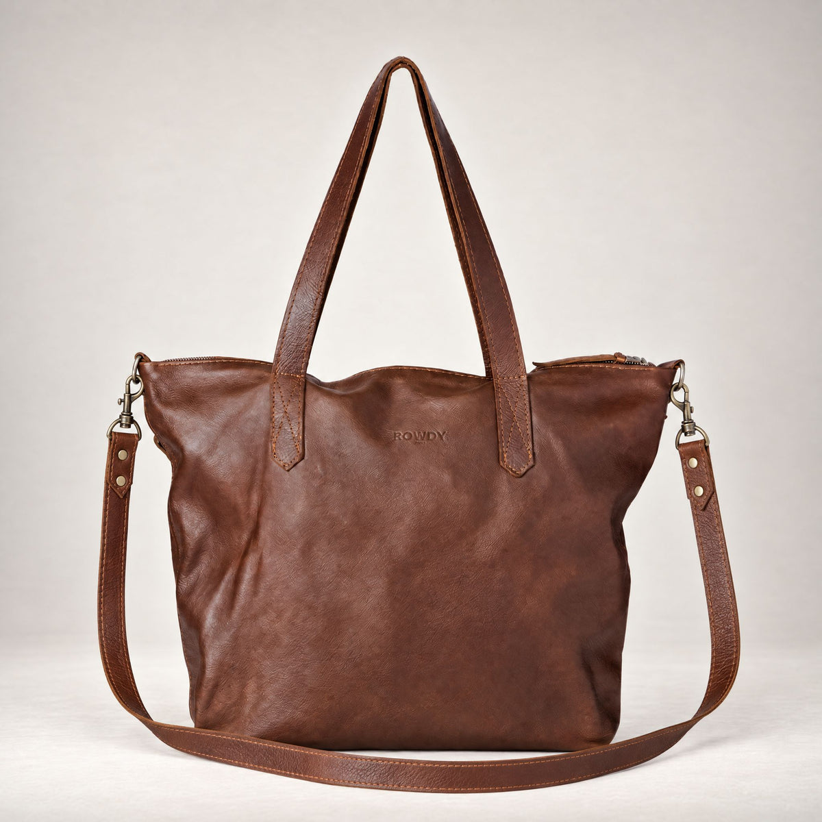 Rowdy Leather Crossbody Bag in Maple (smooth aniline leather), front view, with its detachable crossbody strap