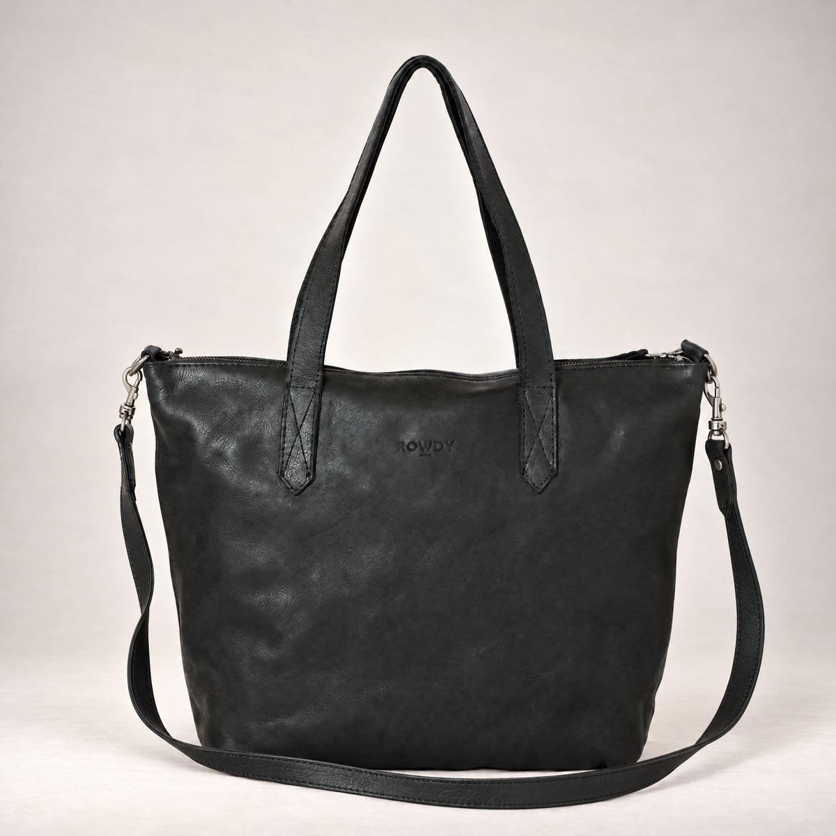 Rowdy Leather Crossbody Bag in Charcoal (black leather), front view, with its detachable crossbody strap