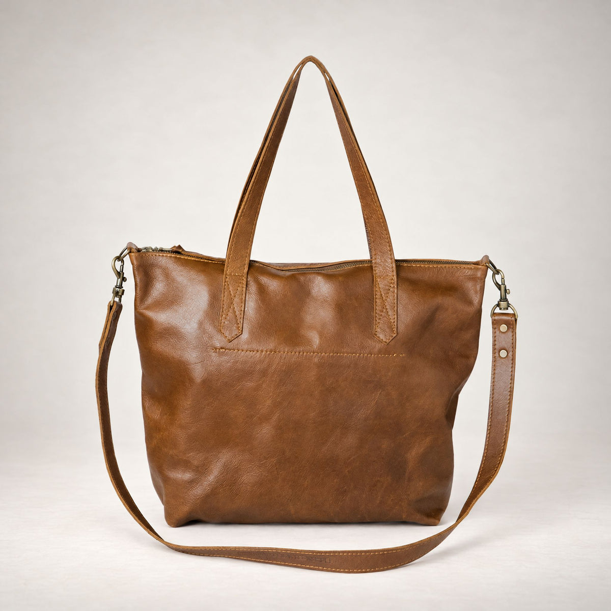 Rowdy Leather Crossbody Bag in Cedar (smooth aniline leather), back view