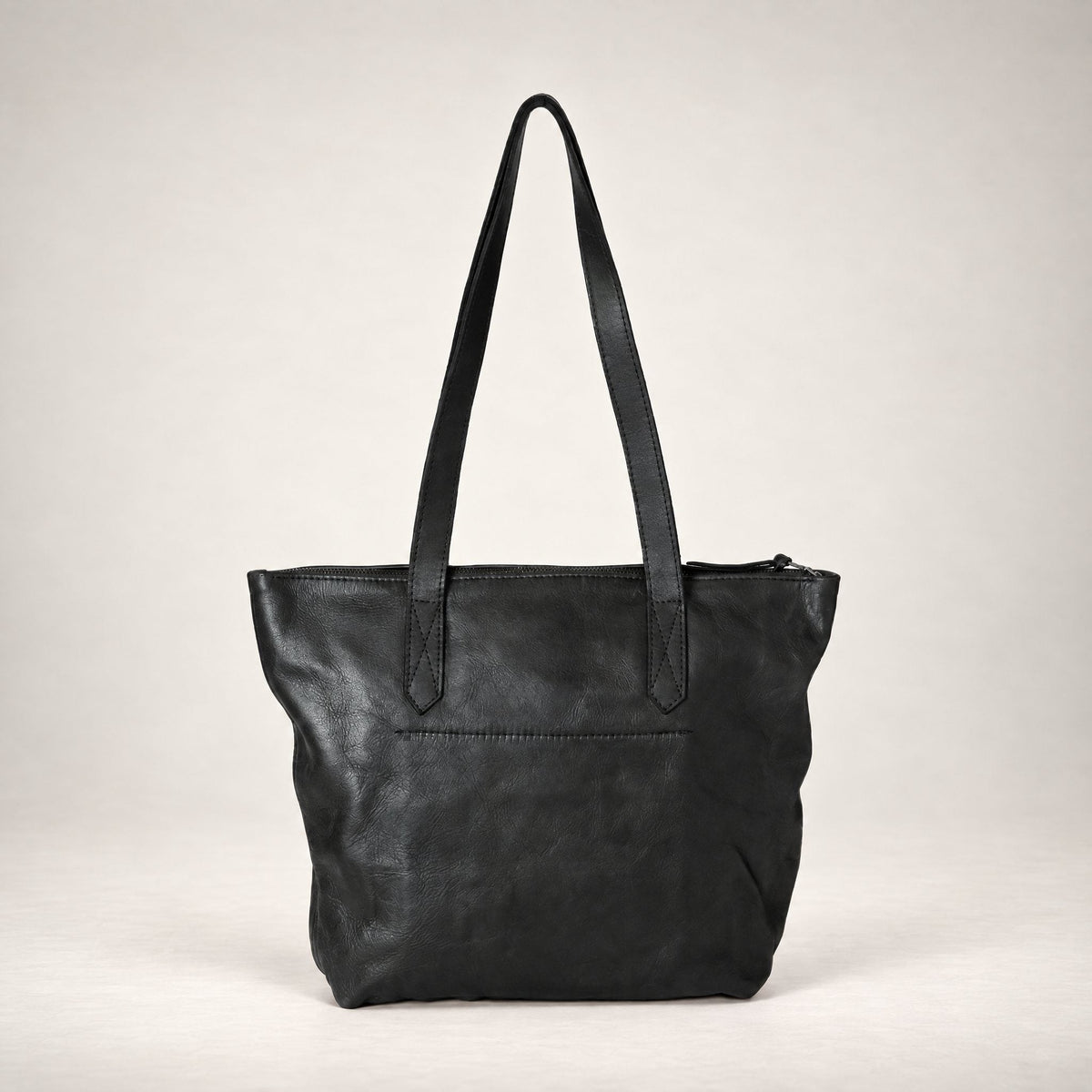 Rowdy Leather Tote Bag in Charcoal (textured aniline leather), back view, full-grain leather with long shoulder straps