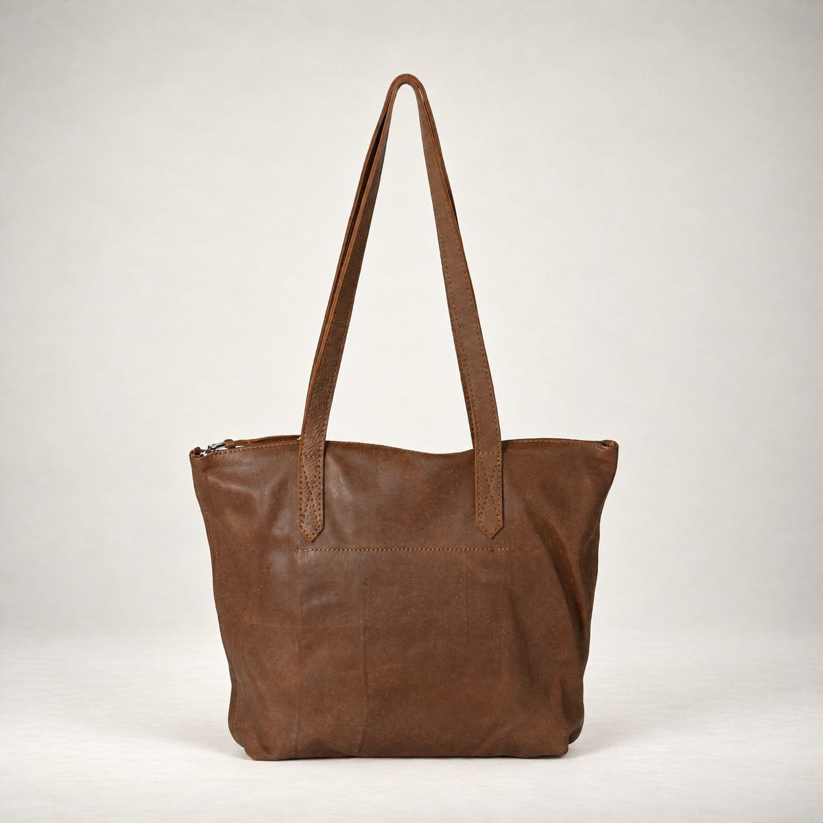 Rowdy Leather Tote Bag in Mountain (velvety nubuck leather), back view, full-grain leather with long shoulder straps