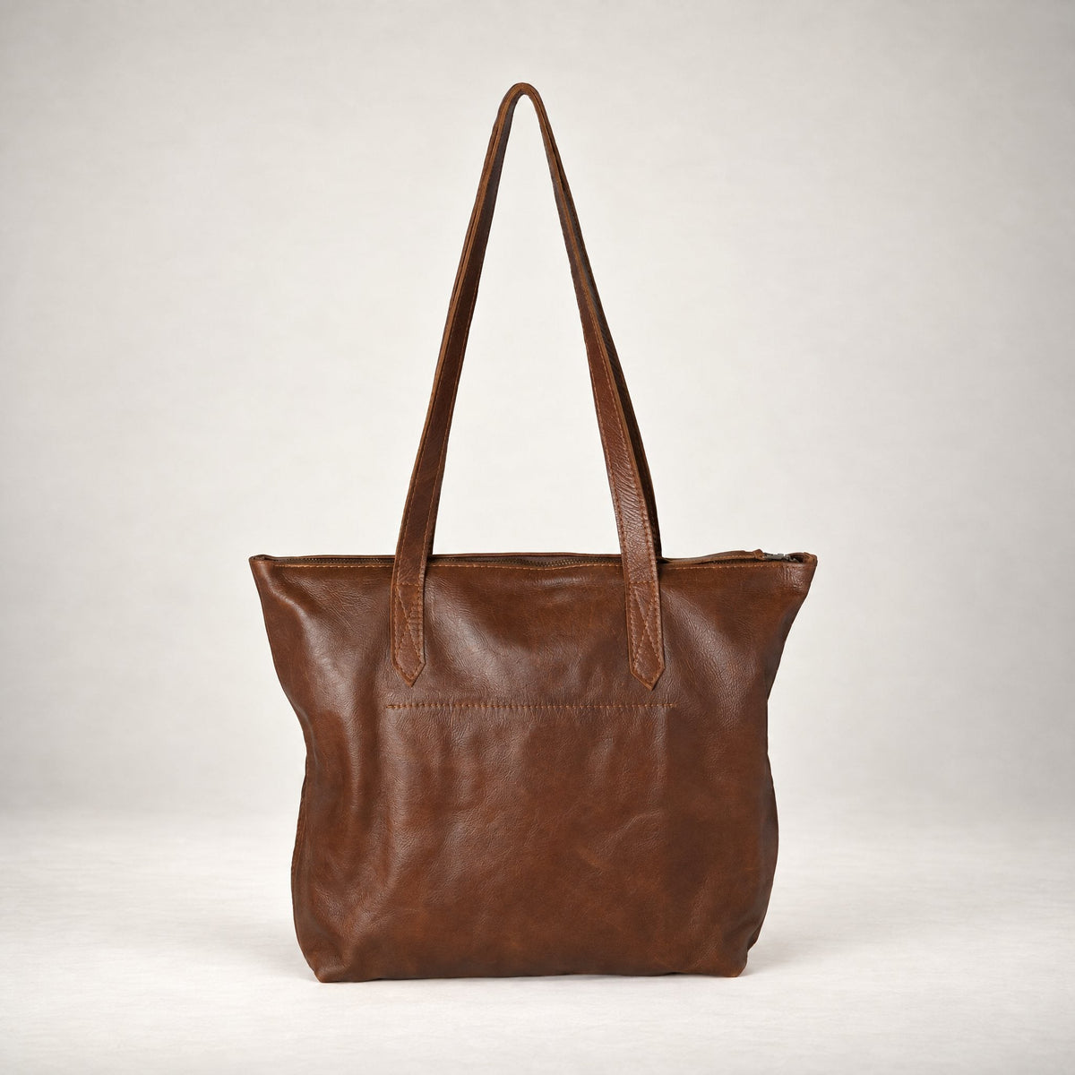 Rowdy Leather Tote Bag in Cedar (smooth aniline leather), back view, full-grain leather with long shoulder straps