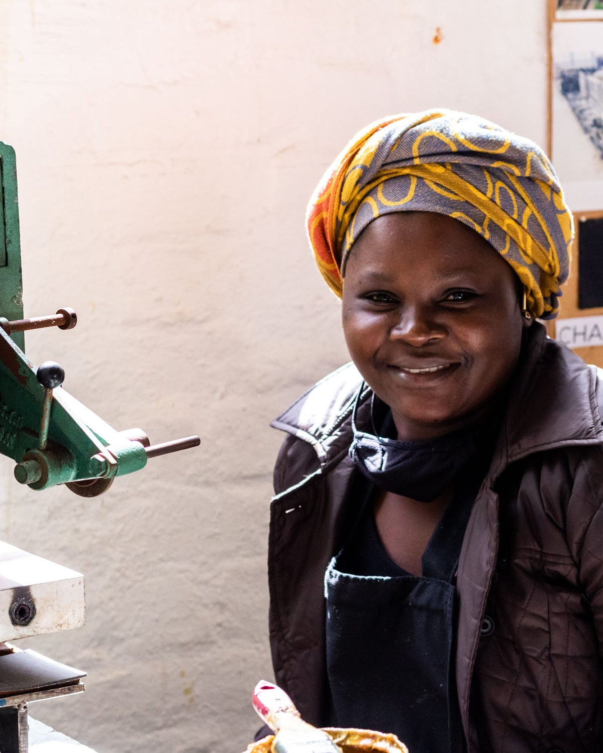 Aida, one of our makers, at her station in our Cape Town workshop